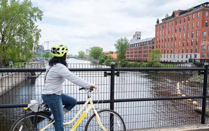 Cyclist Enjoying View Of Lachine Canal