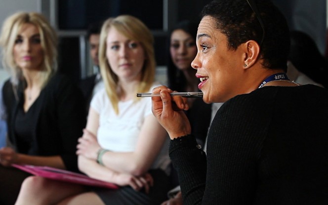 woman speaking to group