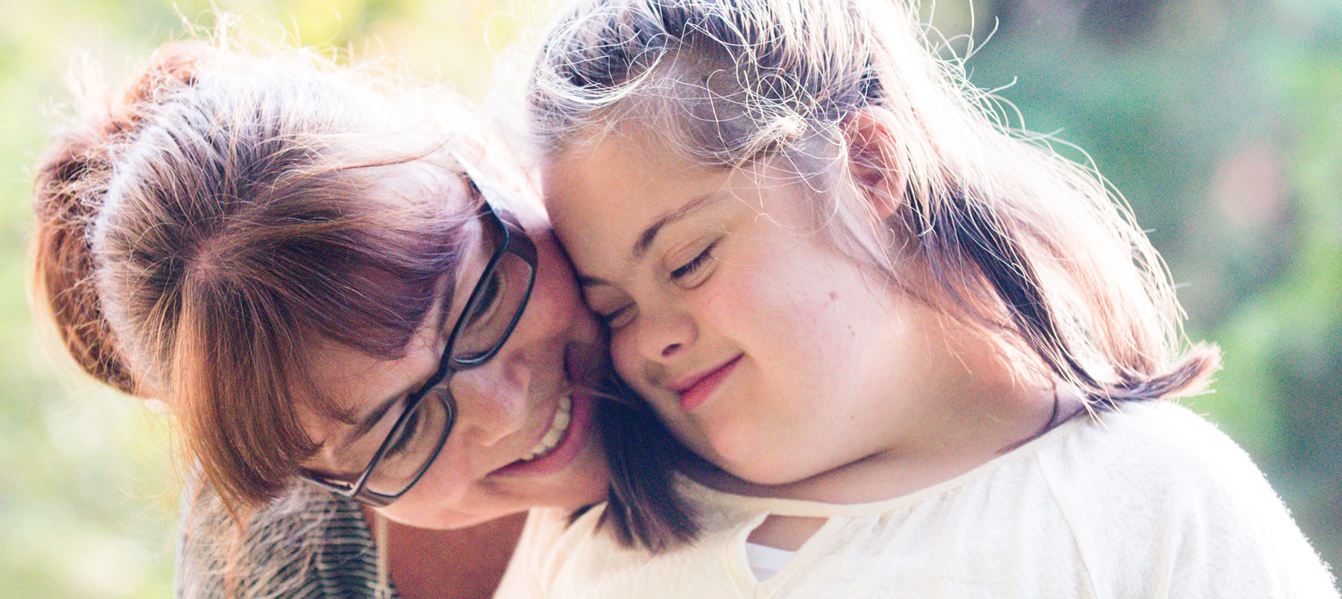 Other With Her Daughter Of 12 Years Old With Autism And Down Syndrome In Daily Lives