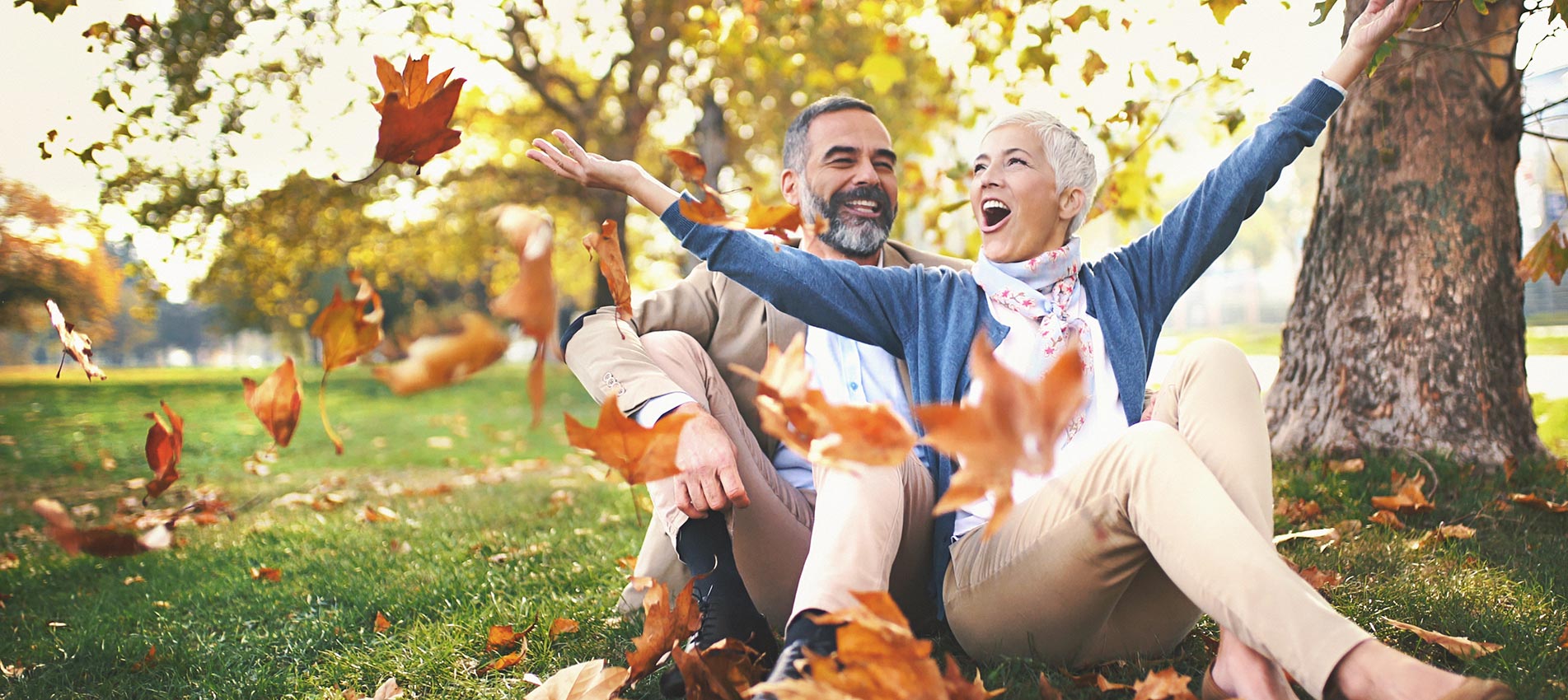 Mid Aged Couple Having Fun In A Park