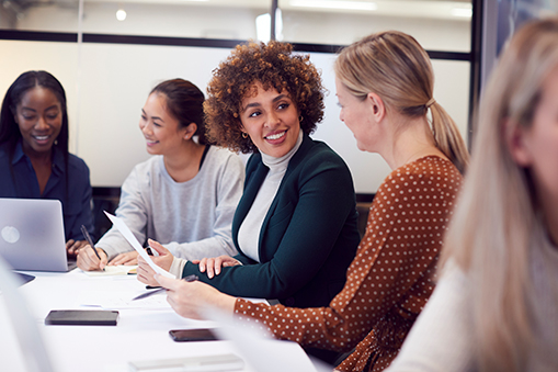 Group Of Businesswomen Collaborating In Creative Meeting